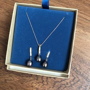 Gold and black pearl necklace and earrings